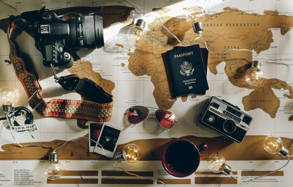 Passport, camera and travel essentials for a UK visit