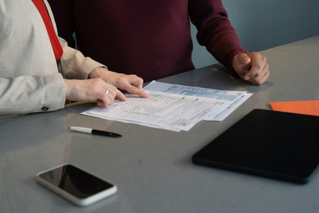 Client signing immigration application documents