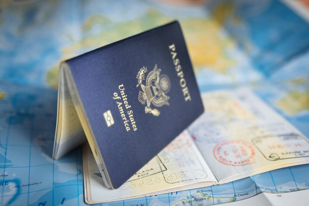 Passport resting on a world map